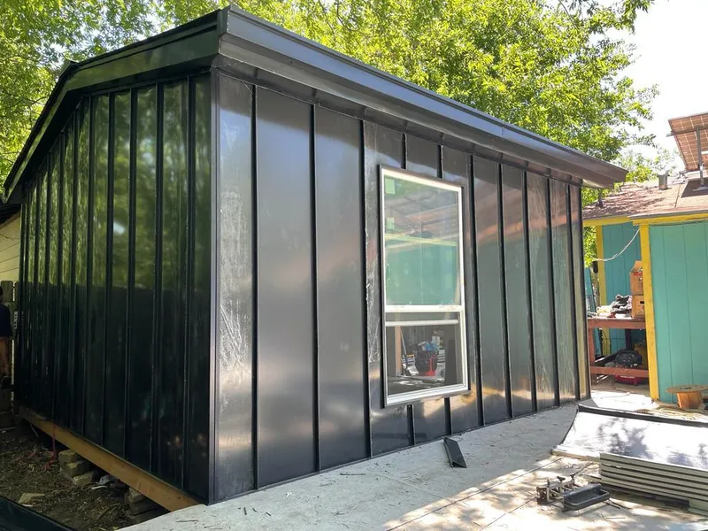 Black standing seam metal wall panels for Metal Roof Installation in Vermillion